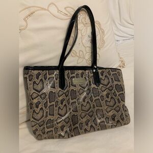 Cole Haan Amazing pattern Print Magnet Snap Closure Handbag. Handles show wear.